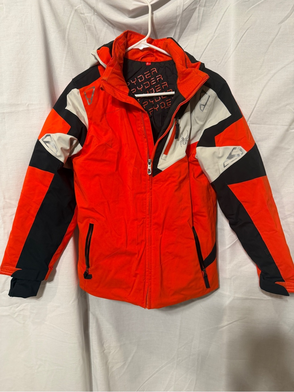 Spyder Kids Orange-Red Ski Jacket with Black & White Panels